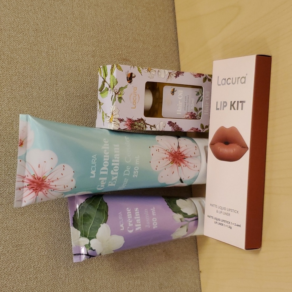 Lacura lip kit, hair oil, hand cream and exfoliant